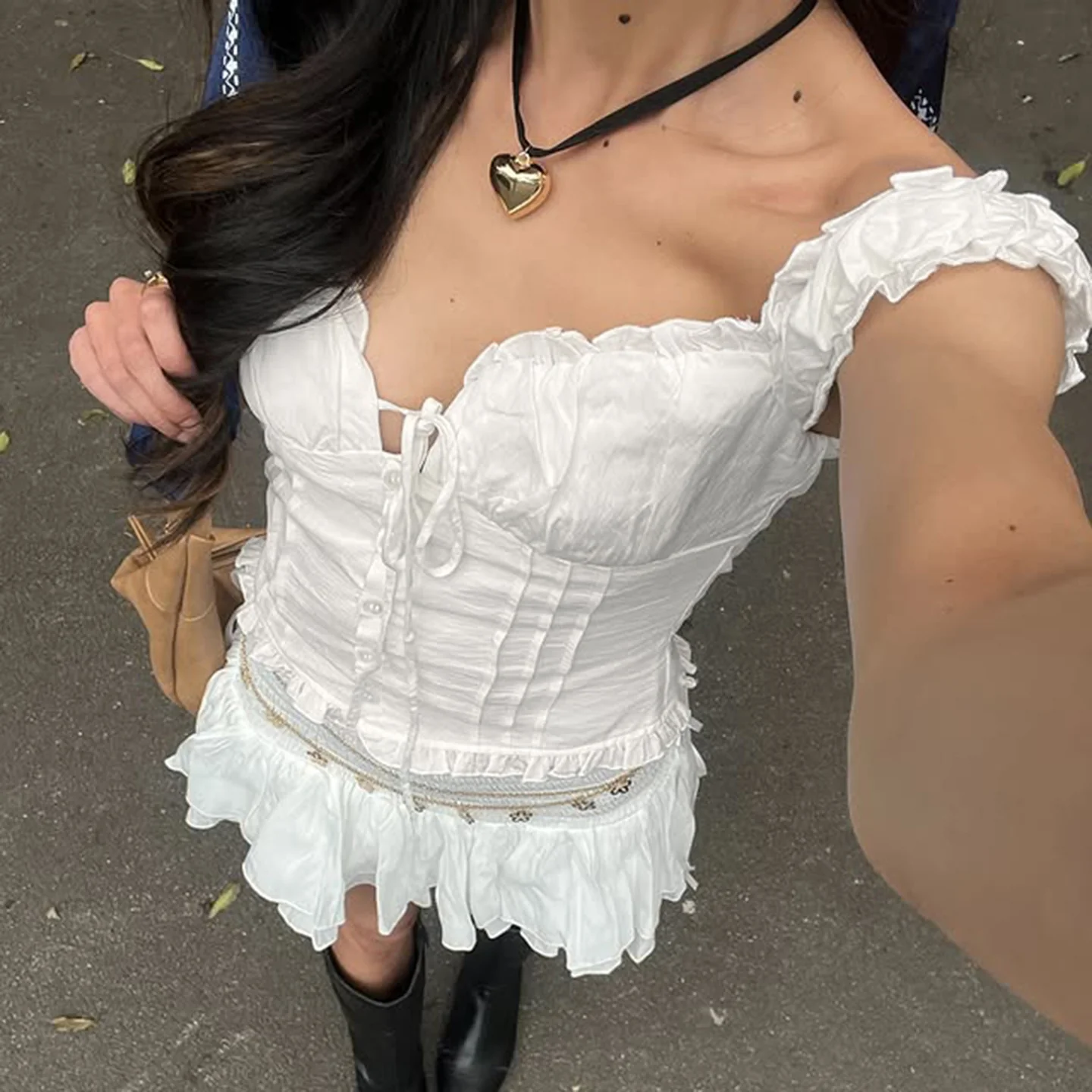 Damen Rüschenbluse mit zarten Schleifendetails und kurzärmeligen Puffärmel Heidi-Mode