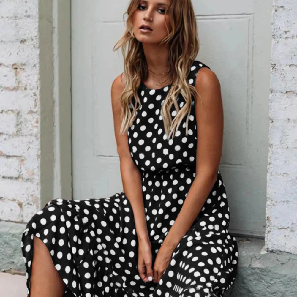 R&B | Schwarzes Polka Dot Midikleid für Einen Retro Chic Look